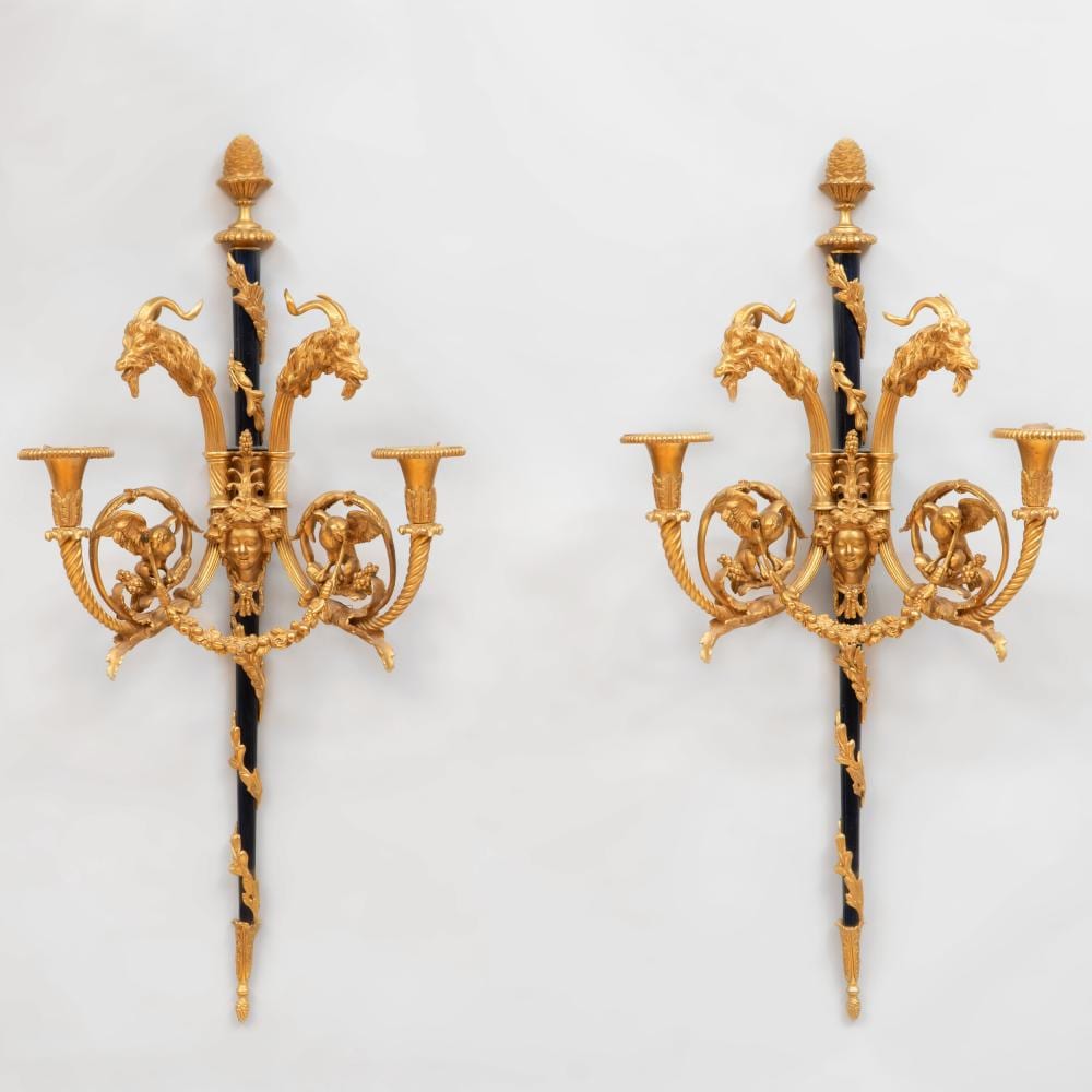 Pierre Gouthière comparable auction result: pair of louis xvi style gilt and patinated bronze two light wall sconces after a model by pierre gouthi re