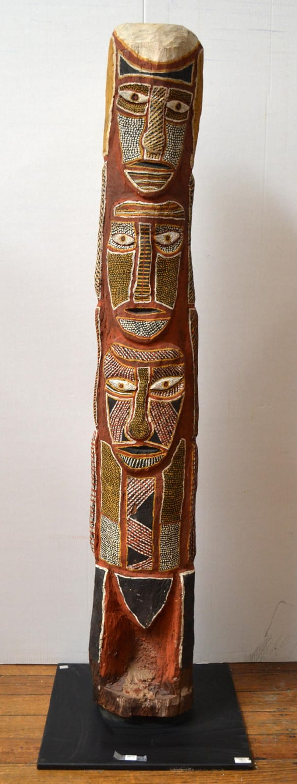 Declan Apuatimi comparable auction result: declan apuatimi ancestors of the purukuparli story c 1980 carved hardwood with natural earth pigments provenance bonhams sydne
