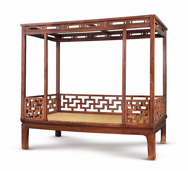 A FINE AND RARE HUANGHUALI SIX-POSTER CANOPY BED, JIAZICHUANG MING DYNASTY, 16TH-17TH CENTURY 87 in. (221 cm.) high, 89 in. (226 cm.) wide, 62 in. (157.5 cm.) deep comparable sale