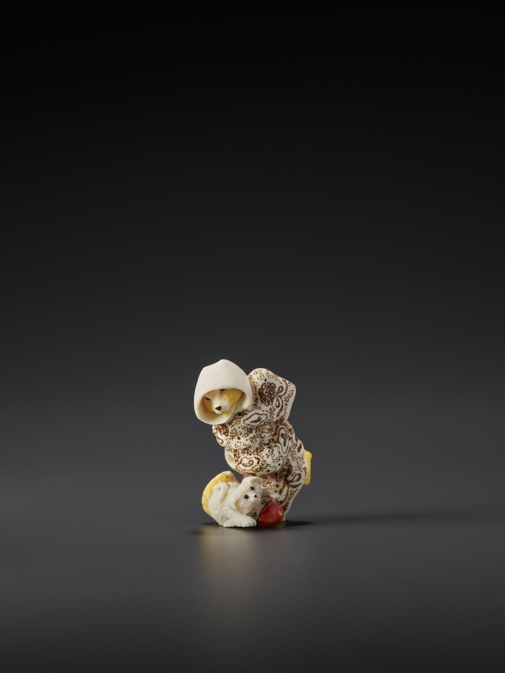 Alexander Derkachenko comparable auction result: kitsune and puppy netsuke by alexander derkachenko