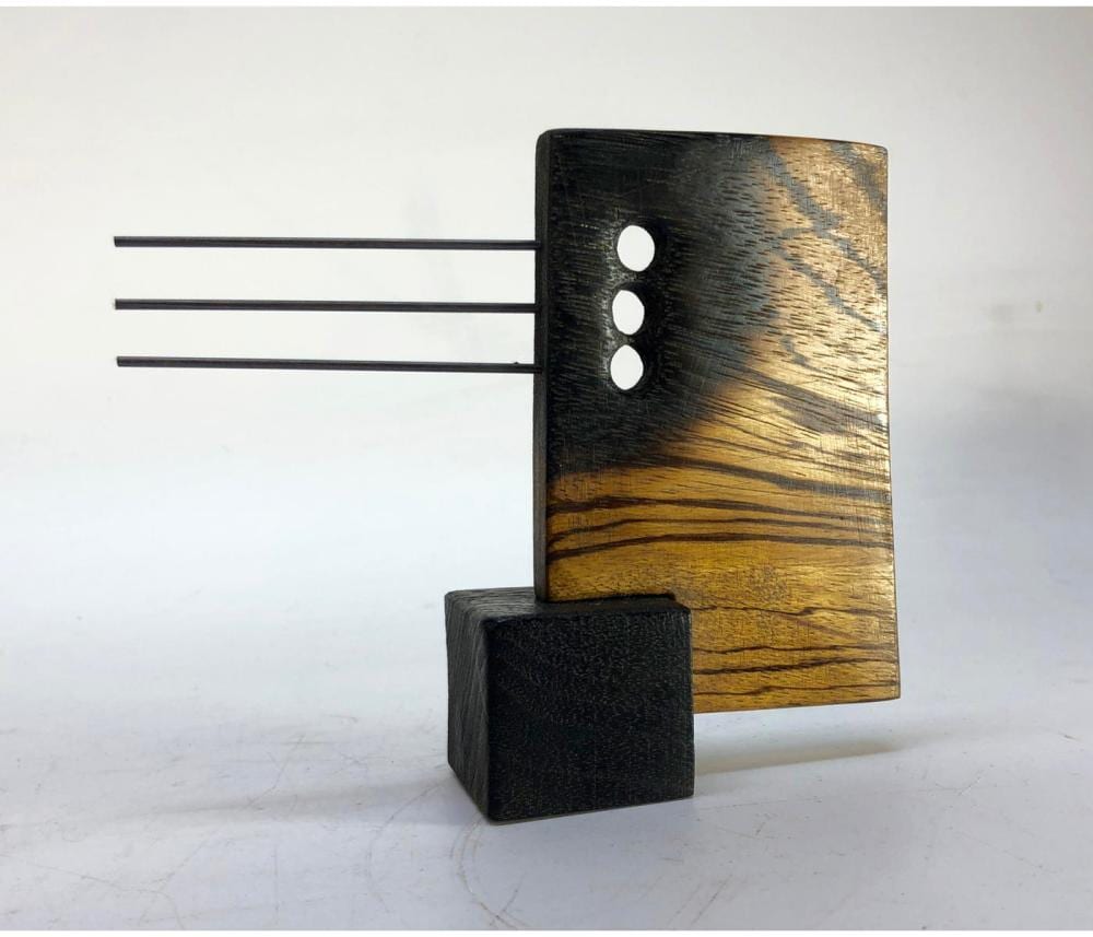 Adam Henderson comparable auction result: adam henderson night shade wood cube modernis