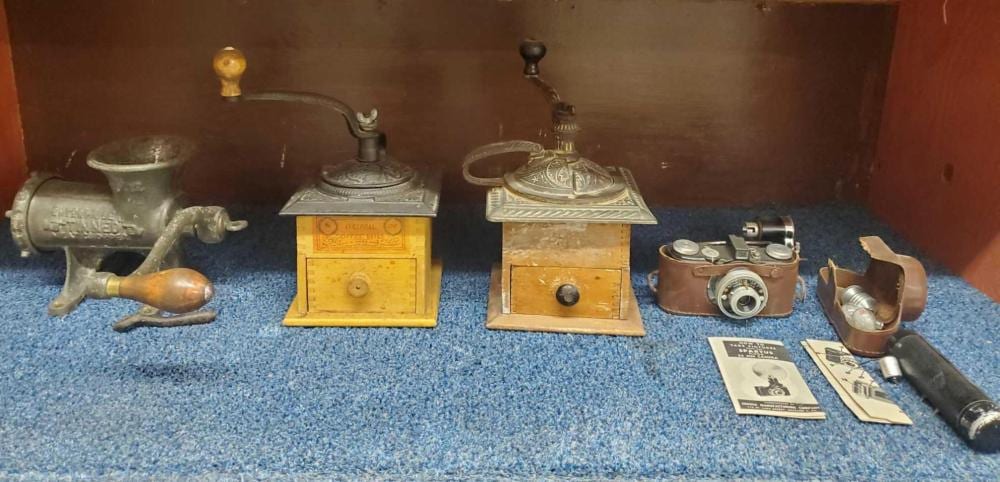 Antique Coffee Mills, Meat Grinder, Camera sold by Alaska Premier Auctions & Appraisals, lot 362 — auction record photograph