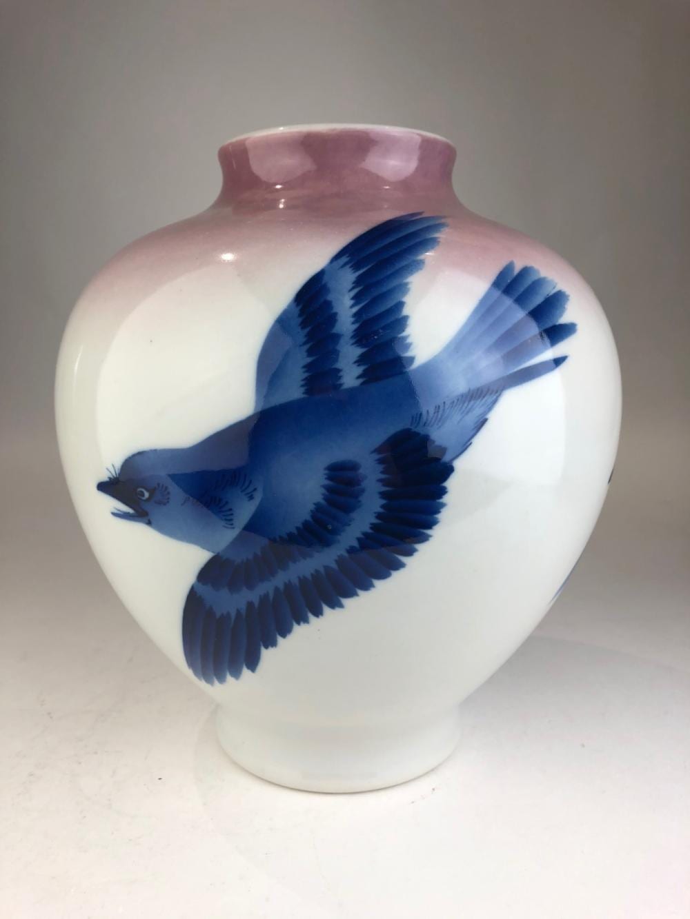 H. (1861) White comparable auction result: japanese porcelain studio vase decorated with flying birds on a white and pink h