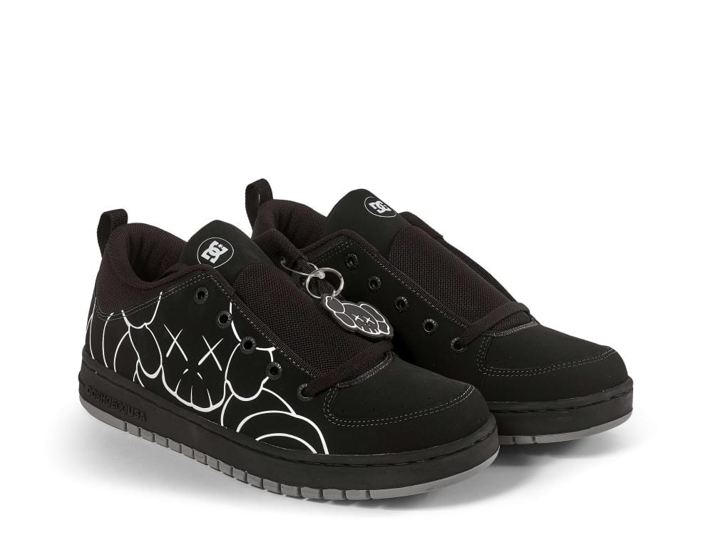 KAWS DC Shoes Artist Project (KAWS) - 2002 Athletic shoes in custom box (black variant, new in box); published by D... sold by Artcurial, lot 183 — auction record photograph
