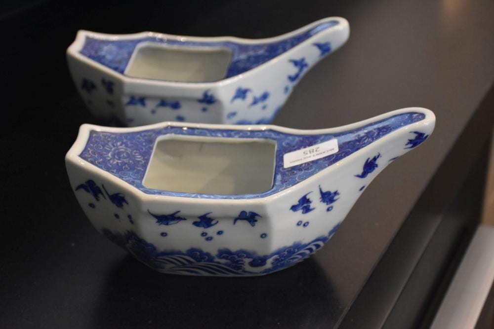 H. (1861) White comparable auction result: a pair of chinese hand painted blue and white boat shaped vases having birds in flight decoration h