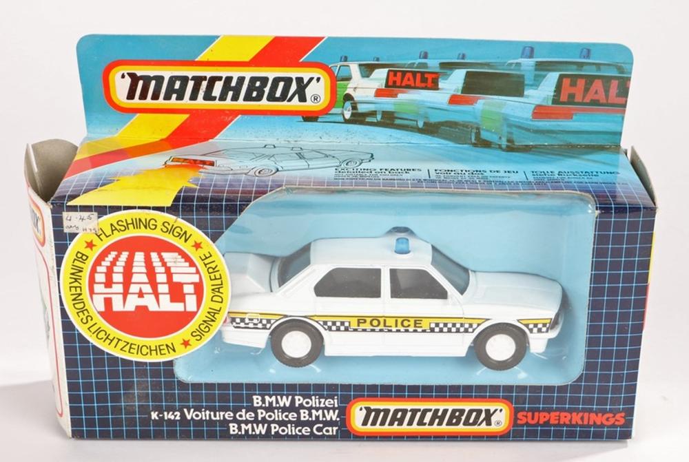 Matchbox Super Kings box with a blue-and-white police car toy in packaging, featuring the Matchbox logo and “POLICE” on the vehicle.