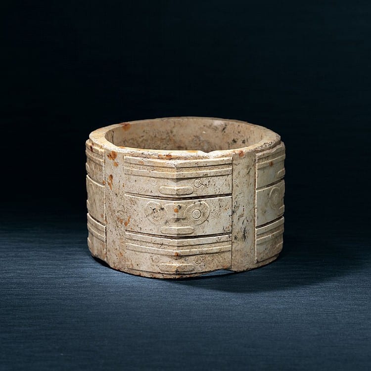 AN EXTREMELY RARE THREE-TIERED JADE CONG LIANGZHU CULTURE, CIRCA 3300-2300 BC 3 1/16 in. (7.8 cm.) high, box comparable sale