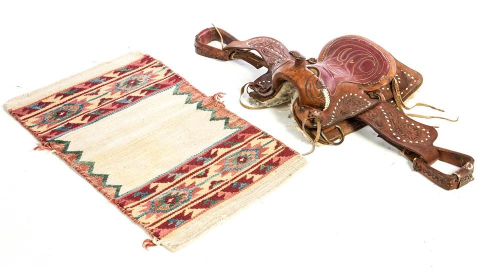 CHILD'S WESTERN SADDLE. sold by Garth's Auctioneers & Appraisers, lot 447 — auction record photograph