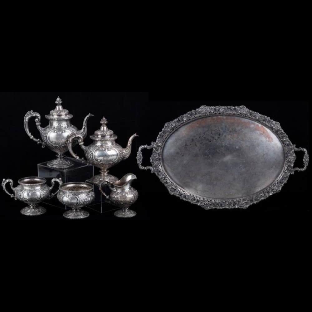 Auction comp thumbnail for Reed and Barton Five Piece Sterling Silver Coffee and Tea Set with Near Matching Silver Plate Serving Tray. (Goldberg Coins & Collectibles, Lot 734)