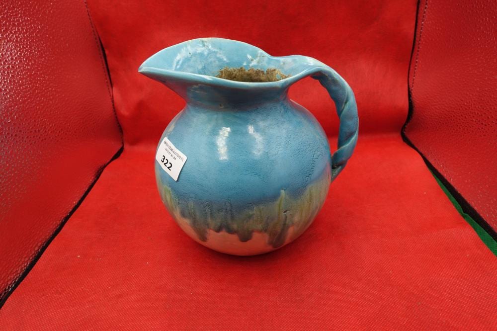 Una Deerborn comparable auction result: room 5 una deerbon blue and green twist handle jug