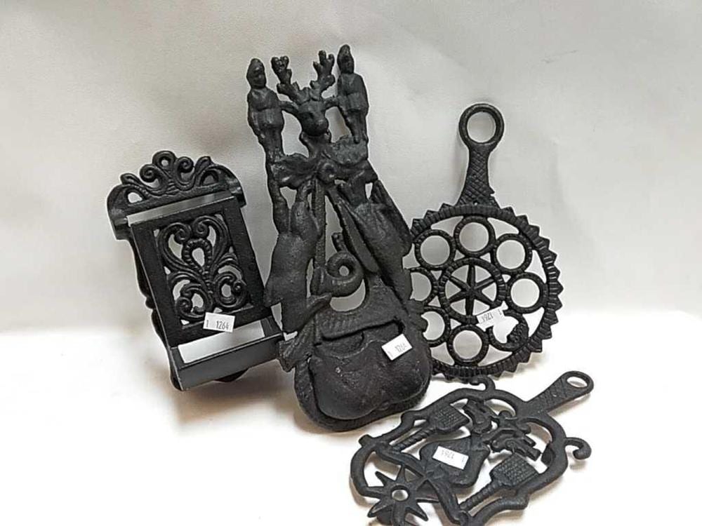 Vintage Cast Iron Trivets, Vintage Cast Iron Match sold by R & R Auction INC, lot 228 — auction record photograph