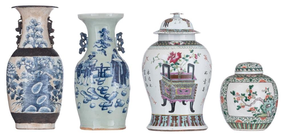 Four Chinese-style ceramic vases with blue-and-white and famille rose floral decoration, shown side by side.