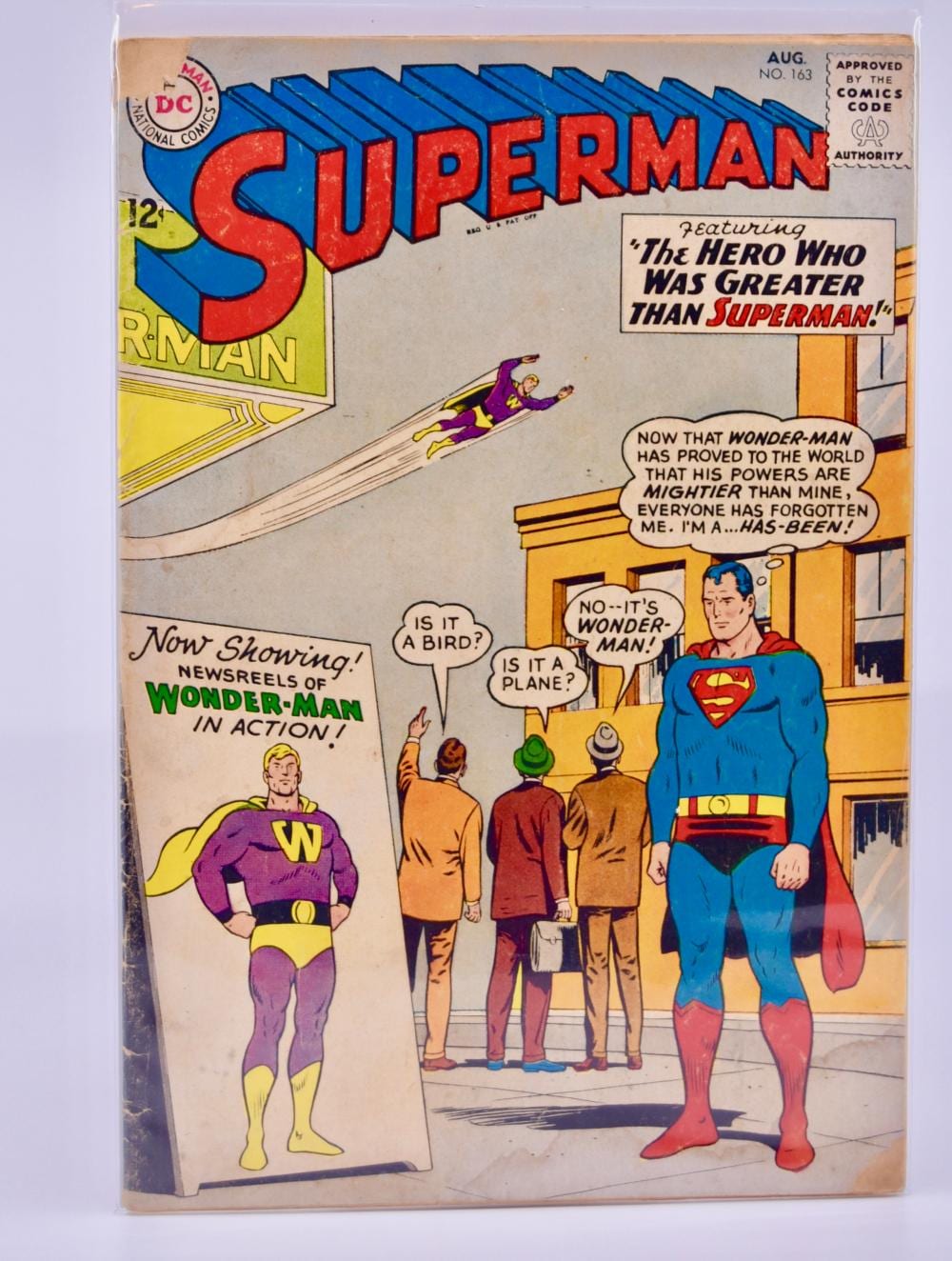 Vintage comic book cover featuring Superman, Wonder Man, and a crowd outside a building, with the title "Superman" at the top.
