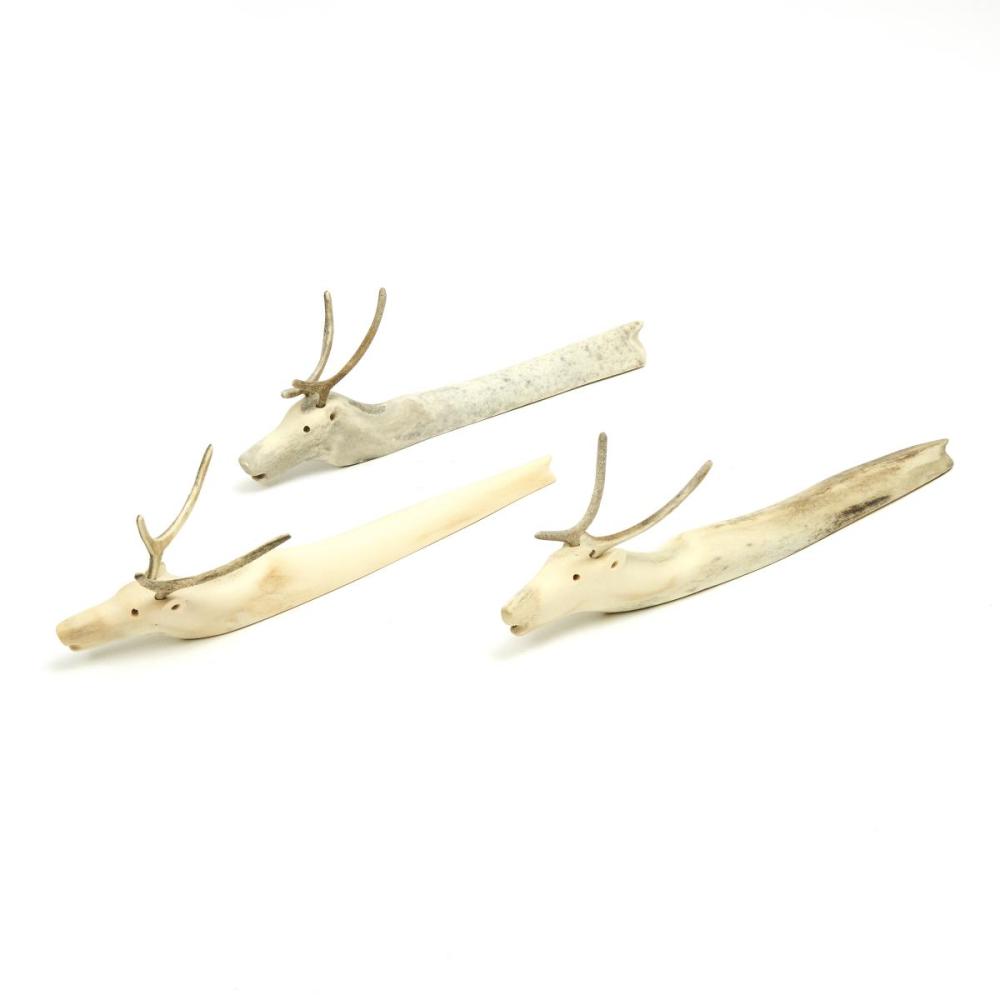 Jacob Irkok comparable auction result: jacob irkok 1937 2009 three swimming caribou antler largest 3 25 x 12 x 2 in 8 3 x 30 5 x 5 1 cm