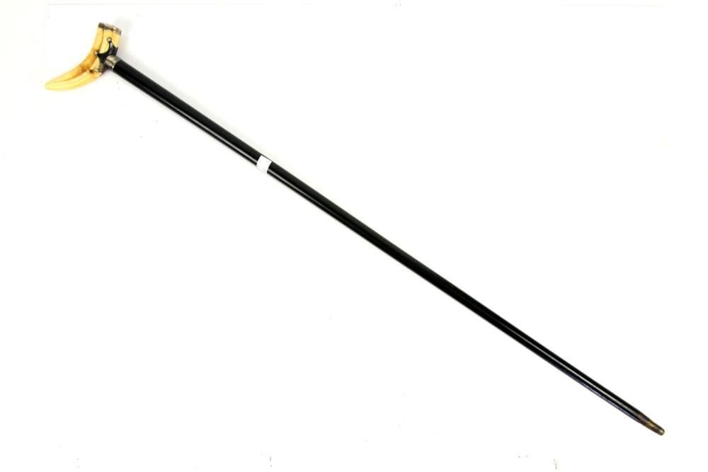 H. Wild comparable auction result: silver mounted walking cane with wild boars tusk h