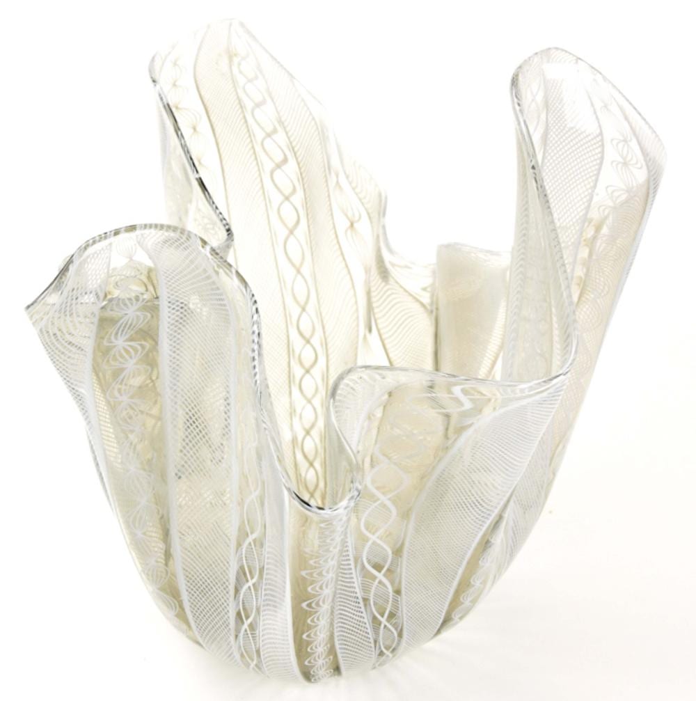 White art glass vase with vertical fluted panels and swirling etched-like decoration, shown against a white background.