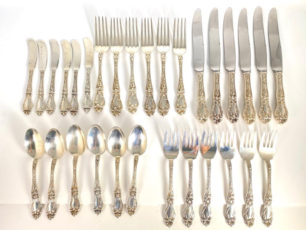 31 Piece Frank Whiting Floral LILY Antique Sterling Silver Flatware Setting for Six Including Dinner Forks, Table Spoons, Butter Knives, Cake Knives, & Salad Forks sold by Fidelity Estate Services, lot 213 — auction record photograph