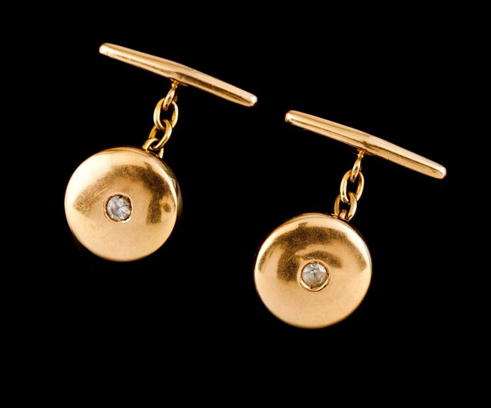 A pair of cufflinks sold by Veritas Art Auctioneers, lot 565 — auction record photograph