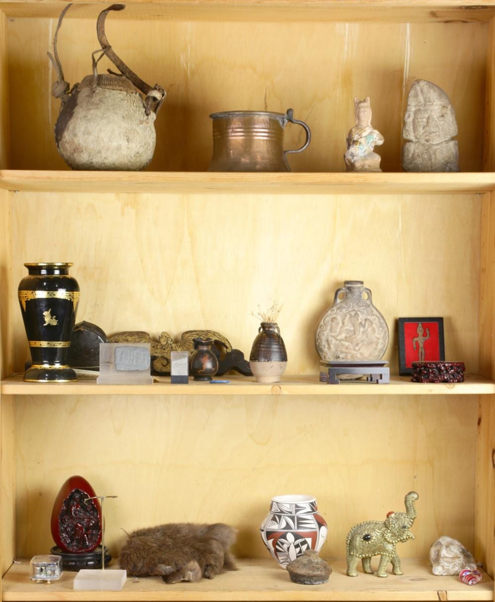 Marianne Navasie comparable auction result: three shelves of decorative items