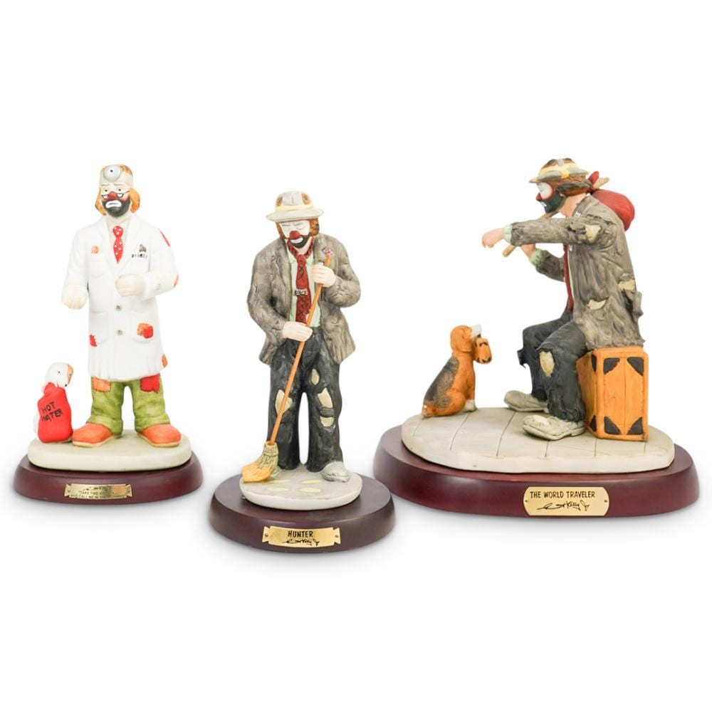 (3 Pc) Emmett Kelly Jr. Porcelain Clown Statues sold by Akiba Galleries, lot 328 — auction record photograph