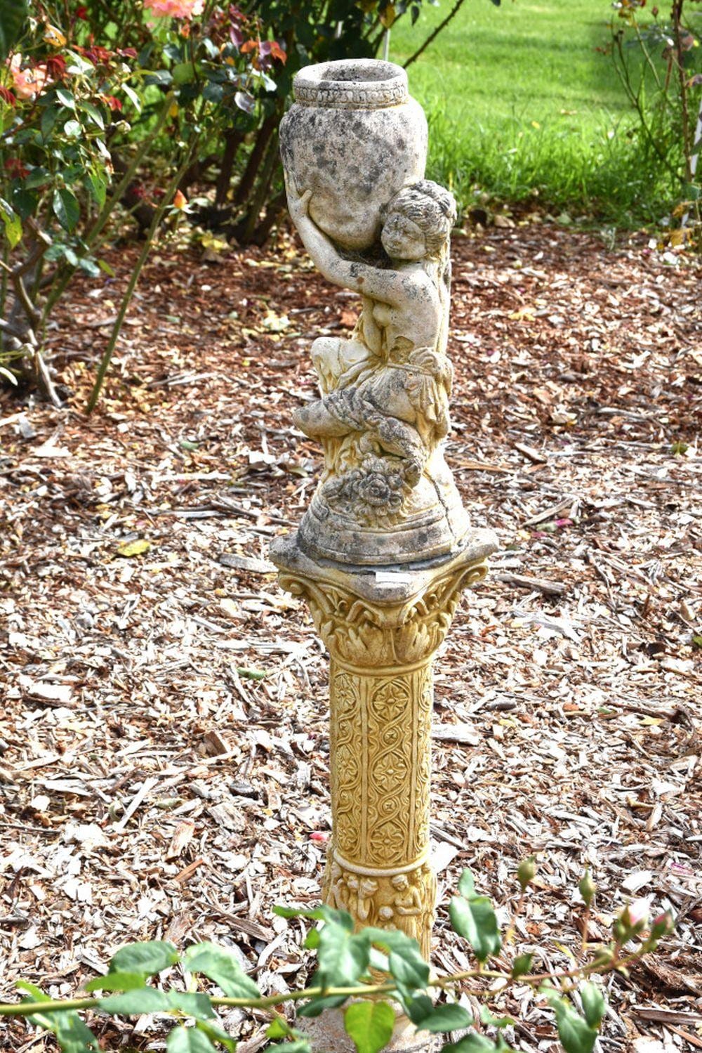 A. (1920) Carrier comparable auction result: a composite stone figure of the water carrier on pedestal base
