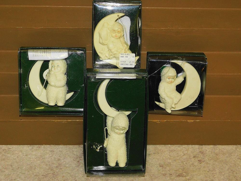4 DEPARTMENT 56 SNOWBABIES BISQUE ORNAMENTS sold by Diefenderfer Auction Company, lot 110 — auction record photograph