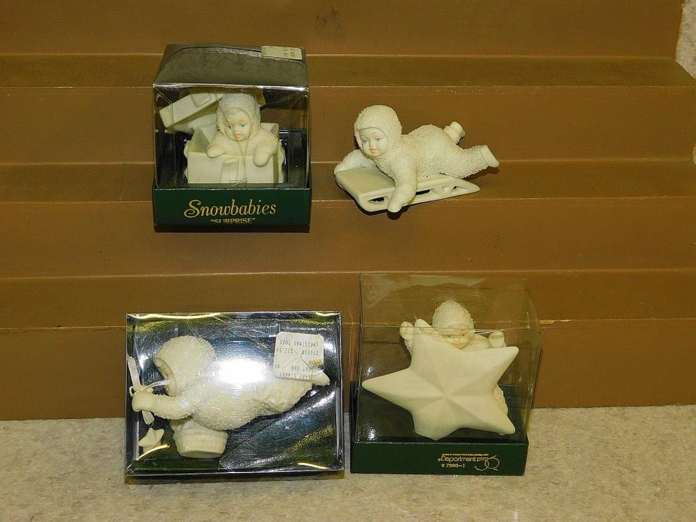 4 DEPARTMENT 56 SNOWBABIES BISQUE ORNAMENTS sold by Diefenderfer Auction Company, lot 127 — auction record photograph