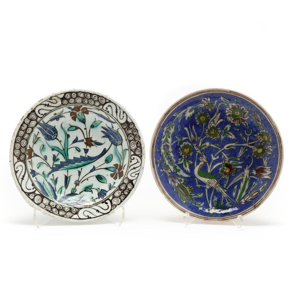 Two Antique Iznik Pottery Dishes sold by Leland Little Auctions, lot 145 — auction record photograph