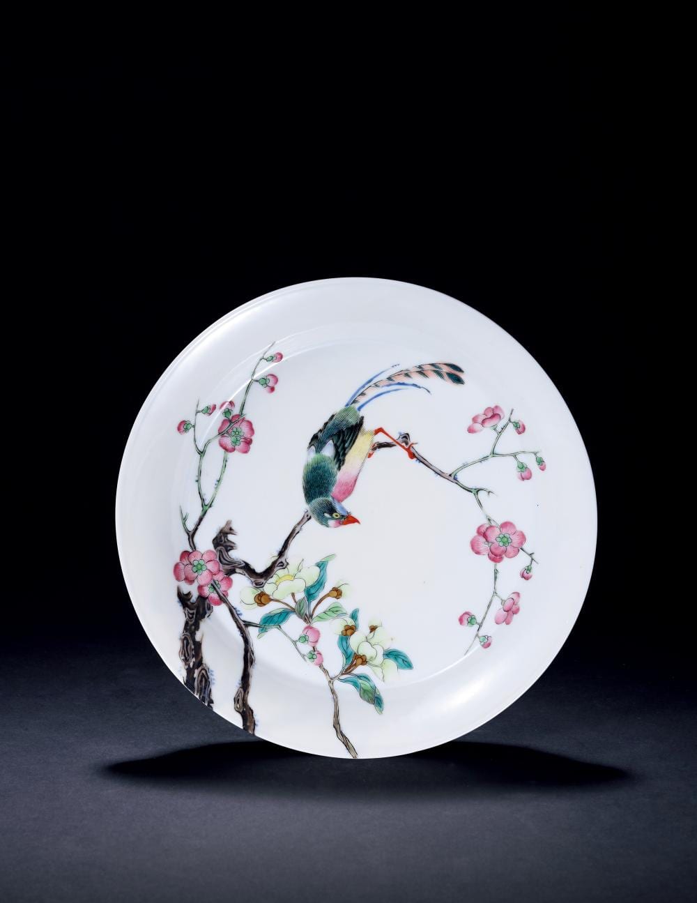 A Famille-Rose Peach-Blossom and Bird Dish, Yongzheng Period, 1723-1735 comparable sale