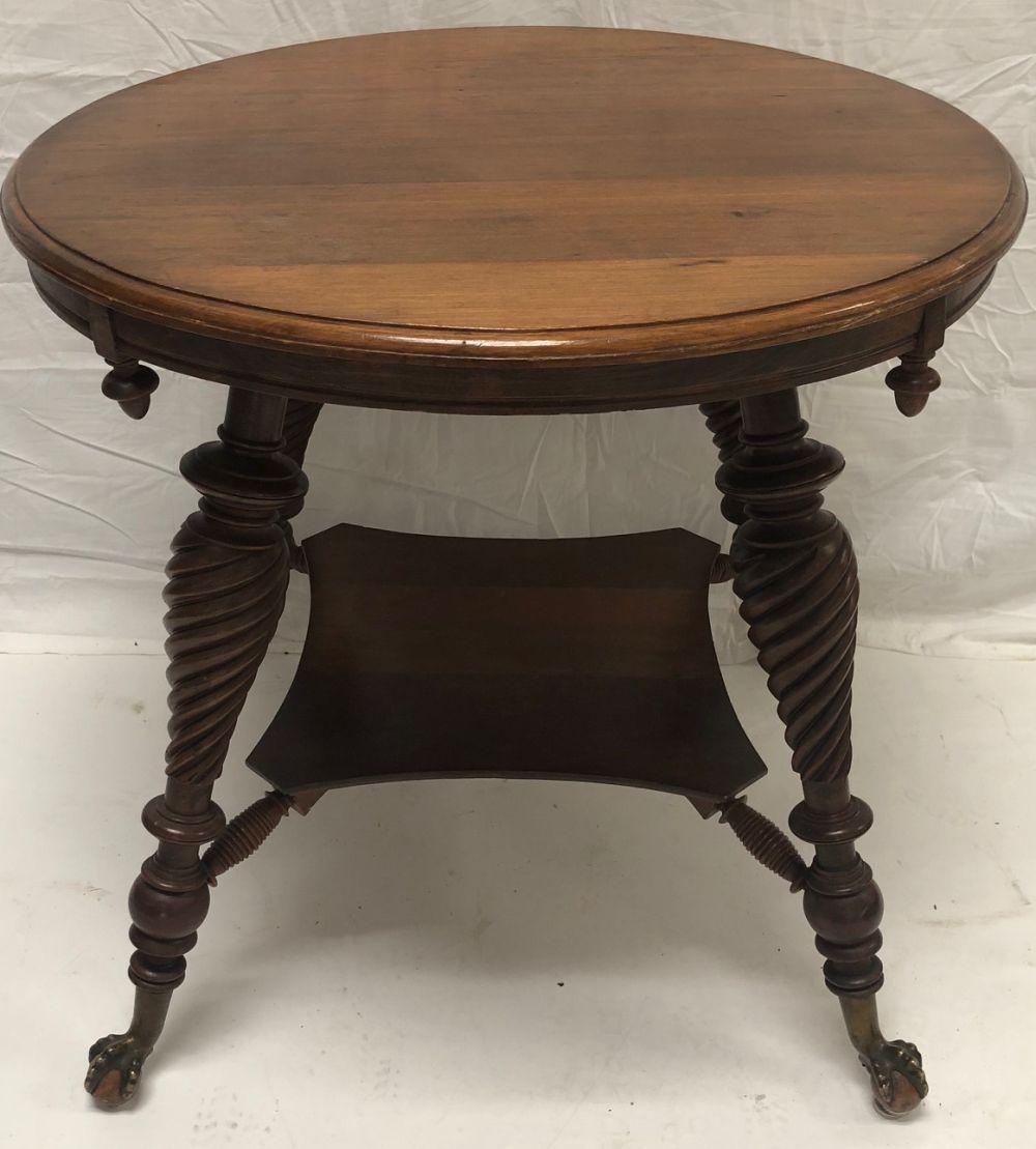 Round Walnut Ball And Claw Foot Parlor Table, Twist Legs sold by Asselmeier May Auctions, lot 150 — auction record photograph