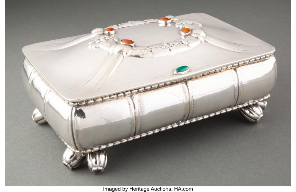 a georg jensen no 58 silver and hardstone footed cigarette box designed by geor · Heritage Auctions · 2021-05-20 Georges Woolliscroft Rhead comparable auction result: a georg jensen no 58 silver and hardstone footed cigarette box designed by geor
