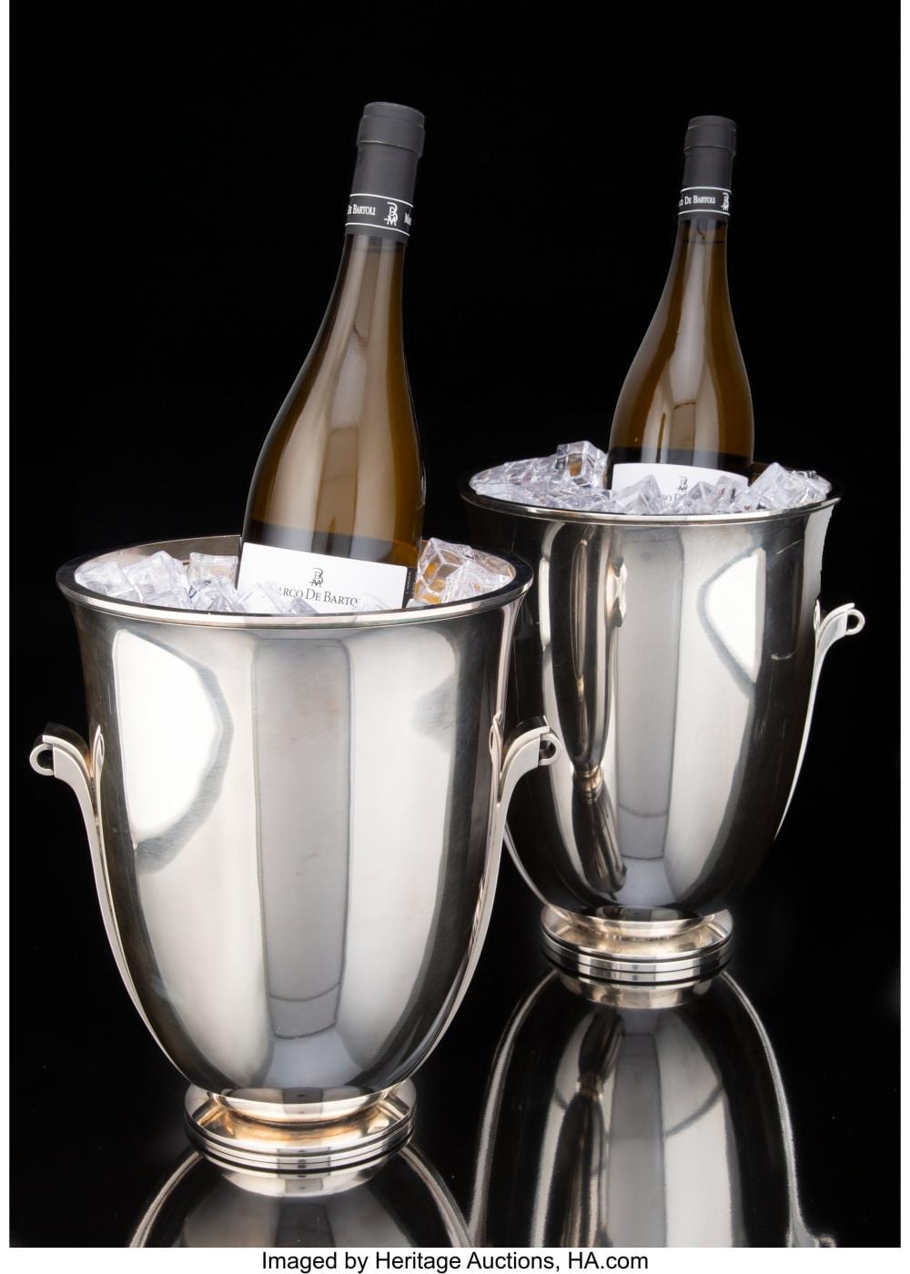 a rare pair of georg jensen silver no 725b pyramid wine coolers designed by har · Heritage Auctions · 2021-05-20 Harley (1908) Griffiths comparable auction result: a rare pair of georg jensen silver no 725b pyramid wine coolers designed by har
