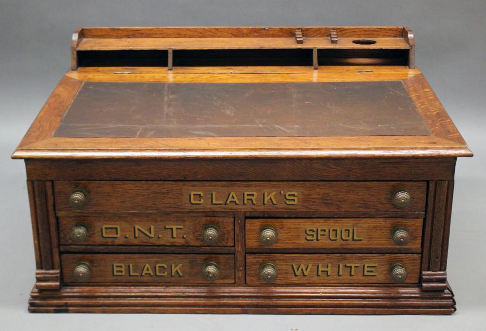 Auction comp thumbnail for Furniture: antique oak slant-top spool cabinet/desk with bro (Roan Inc. Auctioneers & Appraisers, Lot 435)