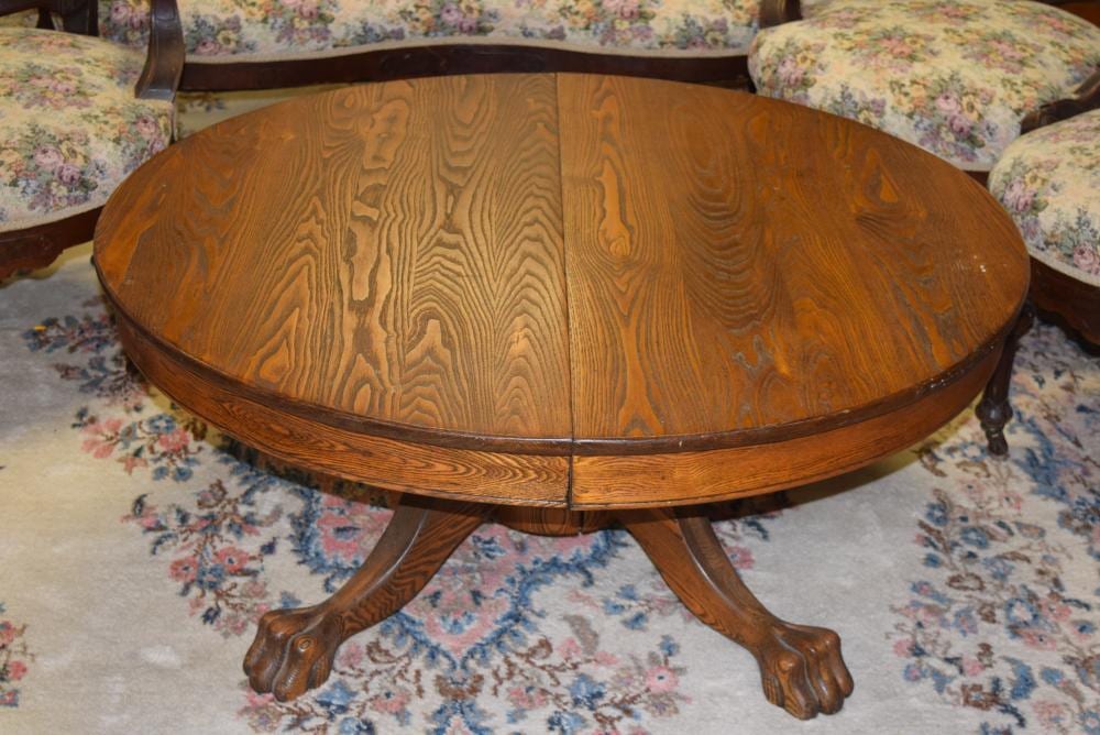 Antique Round Oak Claw Foot Coffee Table sold by Paul Arsenault Auctioneers, lot 291 — auction record photograph
