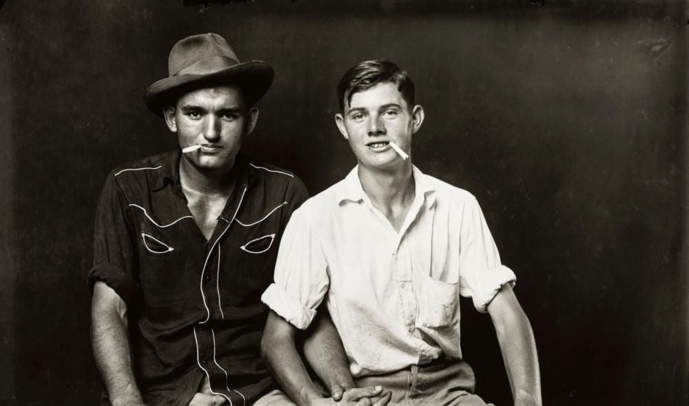 Michael Disfarmer comparable auction result: mike disfarmer american 1884 1959 two pals with cigarettes sheet 27 x 35cm 10 3 4 x 13 3 4in executed in 1944