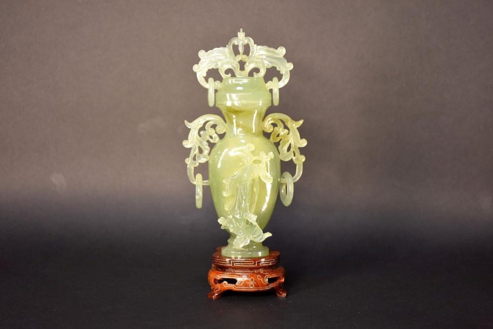 D. Ring comparable auction result: a finely carved chinese jade lidded urn having raised noble lady and ring d