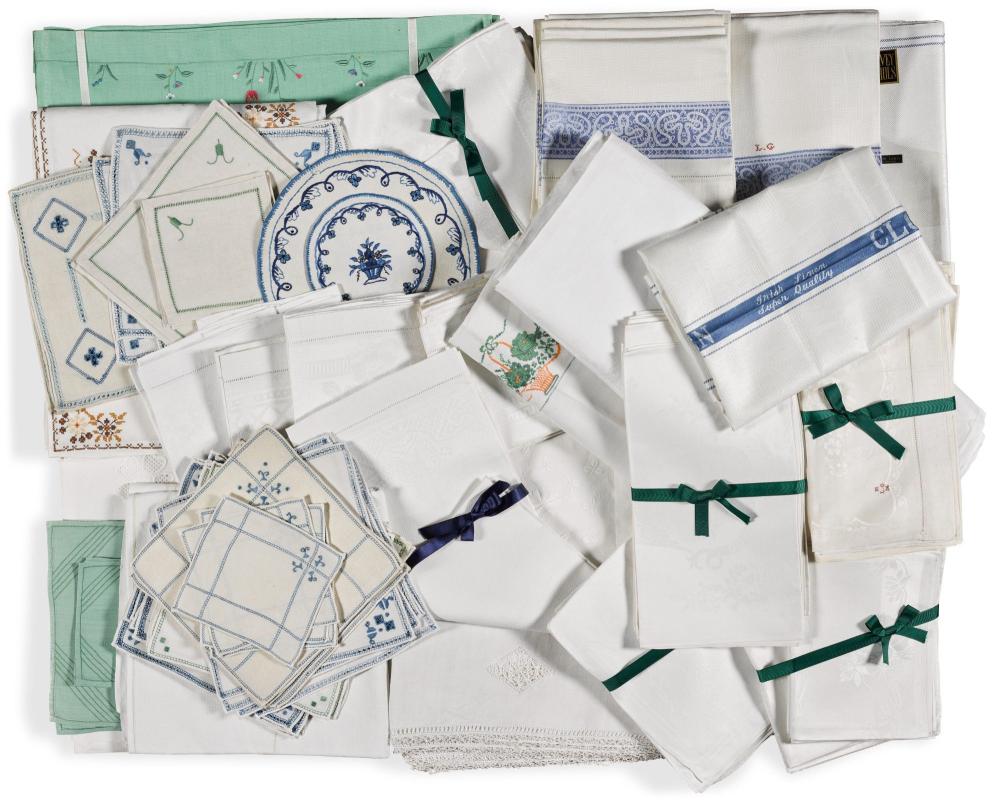 A collection of domestic linen, including Glengall family, damask table cloth and napkins, and other domestic table, hand and kitchen cloths, plate and glass mats, Ireland, 19th-20th century sold by Sotheby's, lot 36 — auction record photograph