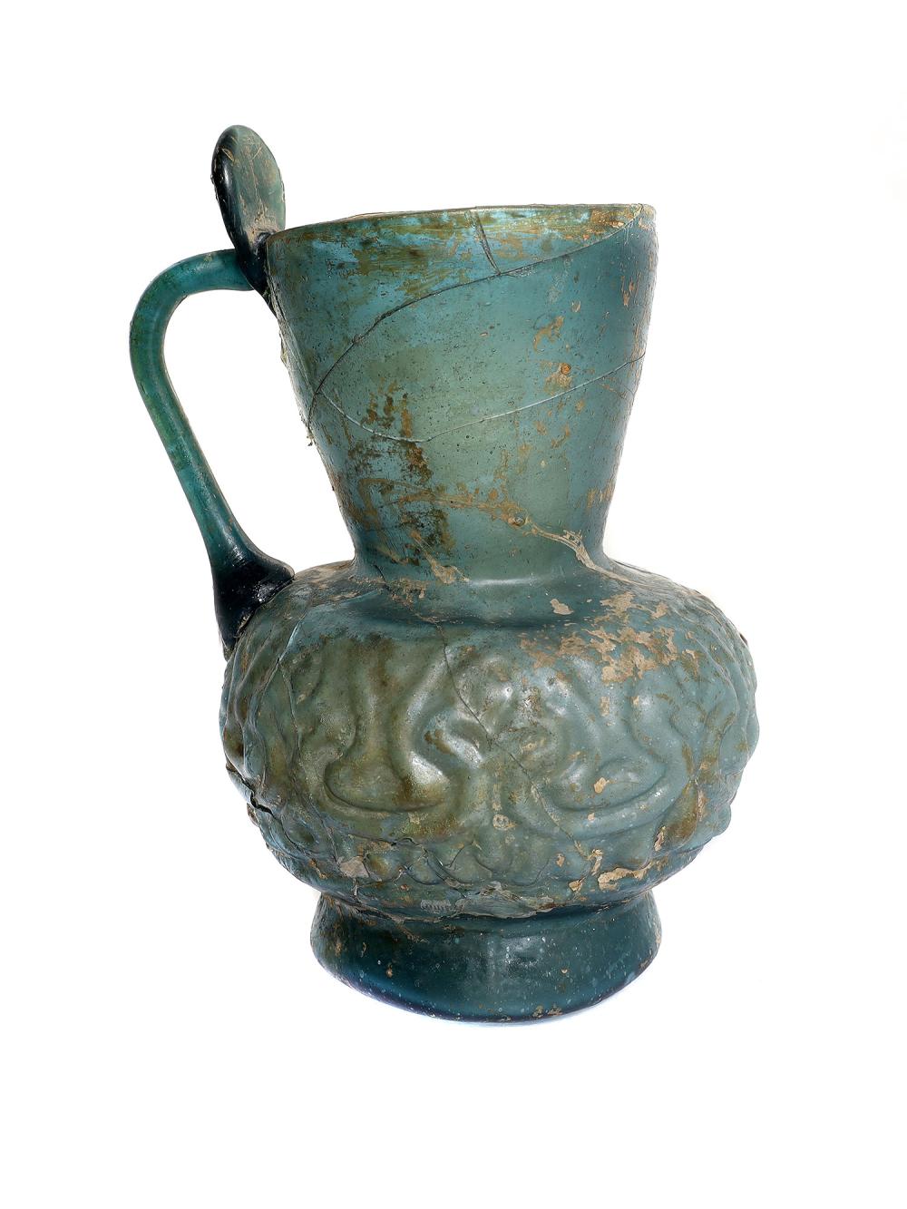 Auction comp thumbnail for AN EARLY RARE ISLAMIC GLASS BOTTLE, 10-12 CC AD. (Helios Auctions, Lot 103)