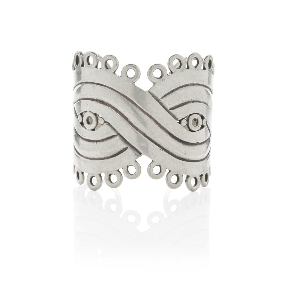 A SILVER CUFF, WILLIAM SPRATLING, TAXCO, MEXICO, CIRCA 1940S sold by Bonhams, lot 191 — auction record photograph