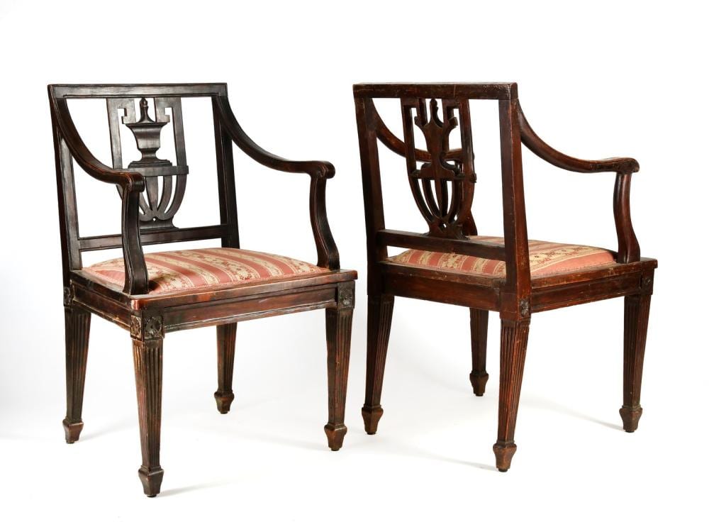 LOMBARDY 19th CENTURY A pair of Louis XVI wood carved armchairs with back in the shape of a flower vase, on turned feet. sold by Capitolium Art, lot 436 — auction record photograph