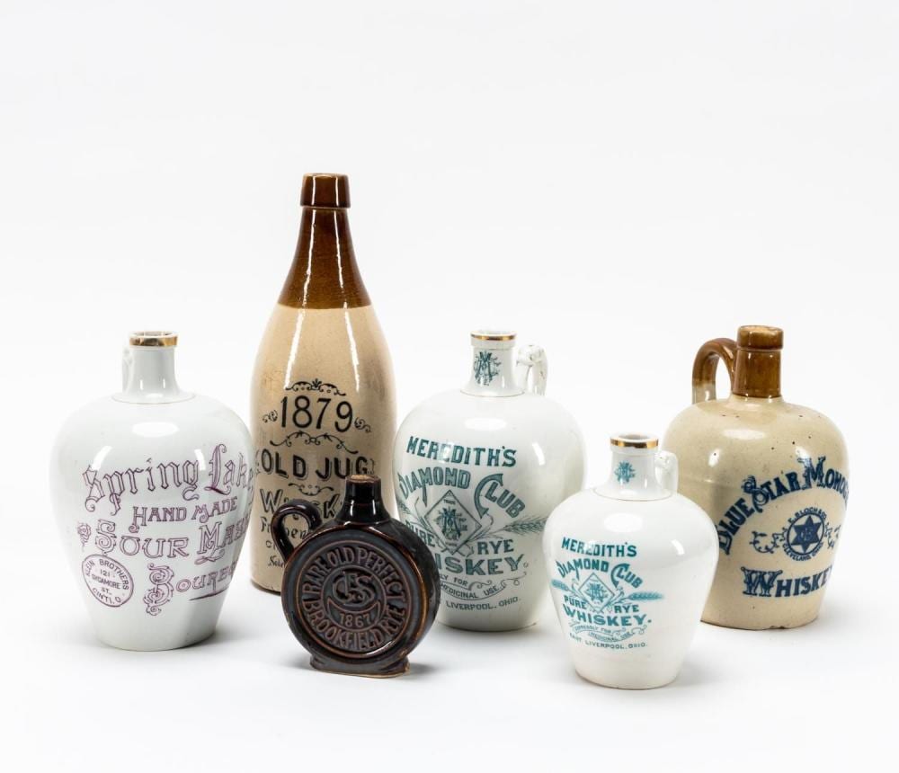 GROUP OF 6 OHIO WHISKEY ADVERTISING JUGS & BOTTLE sold by Ahlers & Ogletree Inc., lot 1316 — auction record photograph