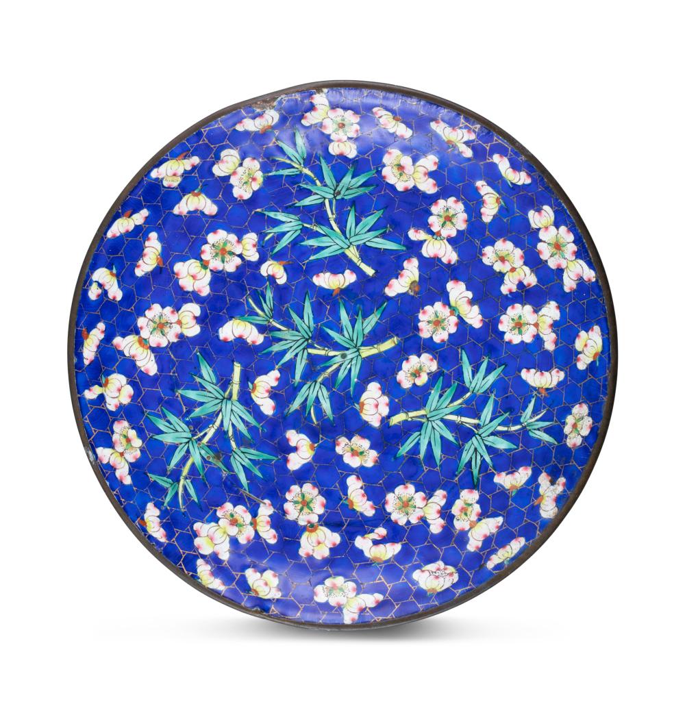 A PHAP LAM / HUE ENAMEL ON COPPER ‘BAMBOO AND PRUNUS' DISH POSSIBLY FROM ONE THE SERVICES OF H.M. THE EMPERORS THIEU TRI AND TU DUC Vietnam, Nguyen Dynasty, Presumably 1841-1883 The obverse of the dish all covered in night blue with a gold honeycom sold by Adam's, lot 189 — auction record photograph