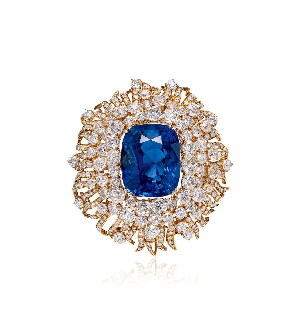 A SPECTACULAR 102.91 CARAT SRI LANKA SAPPHIRE AND DIAMOND BROOCH/RING, BY Jacques Timey For Harry Winston comparable sale