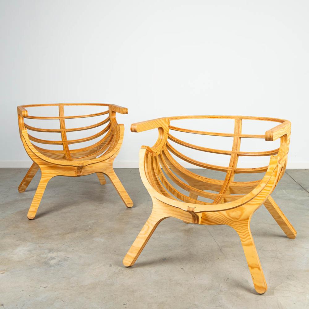 A pair of lounge chairs, made of plywood cut on the CNC machine. 21st century sold by Flanders Auctions, lot 805 — auction record photograph