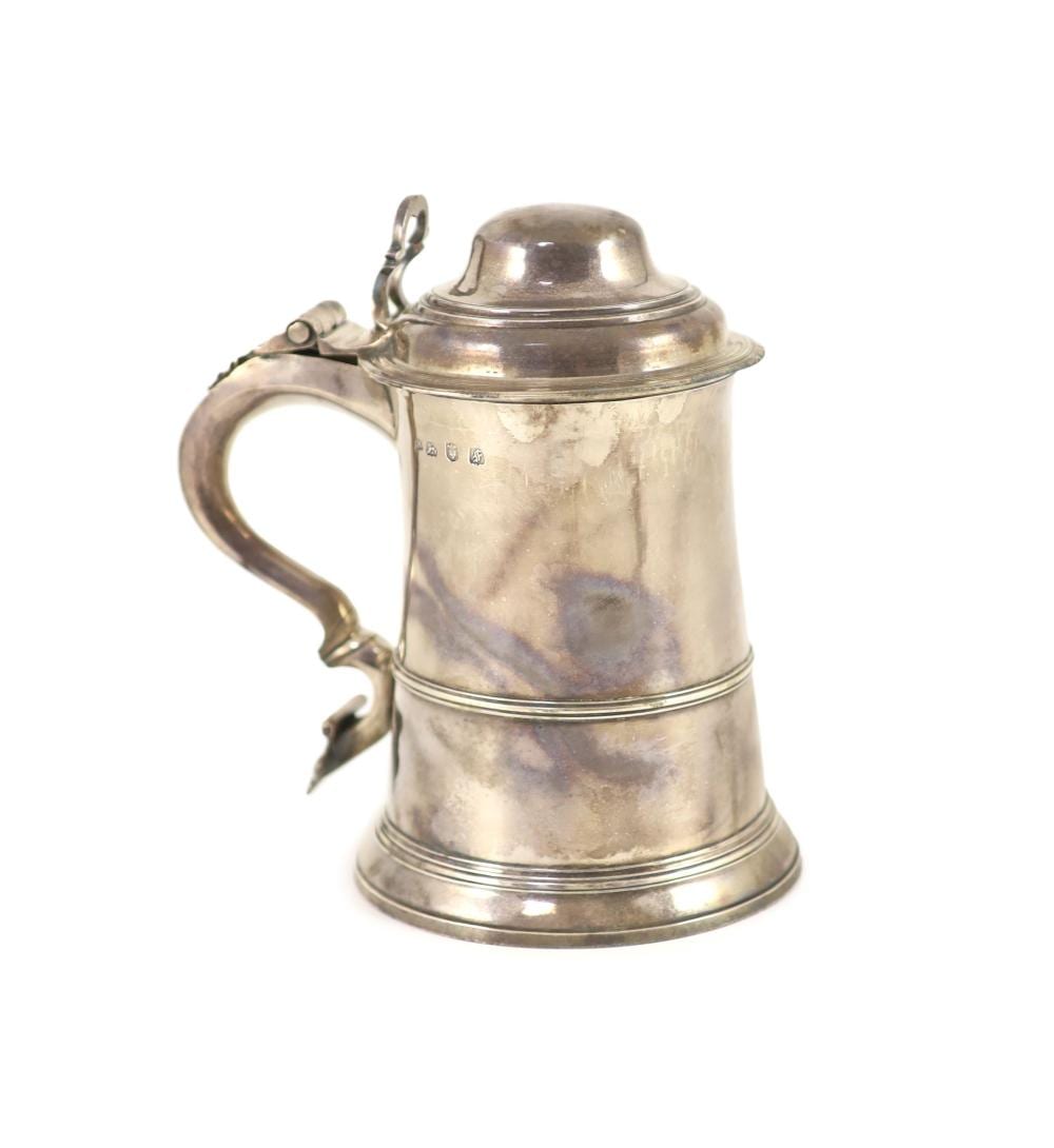 John Moore comparable auction result: an early george iii silver tankard by john moore