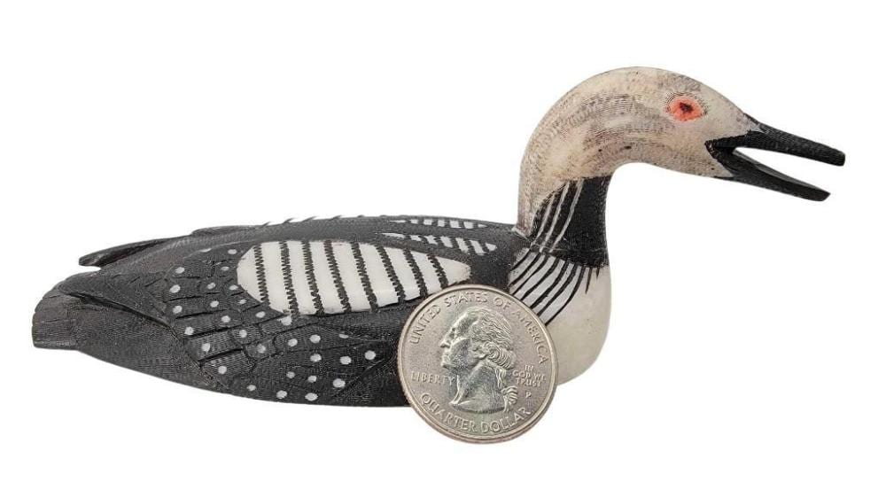Larry Mayac comparable auction result: larry mayac 5 scrimshaw arctic loon