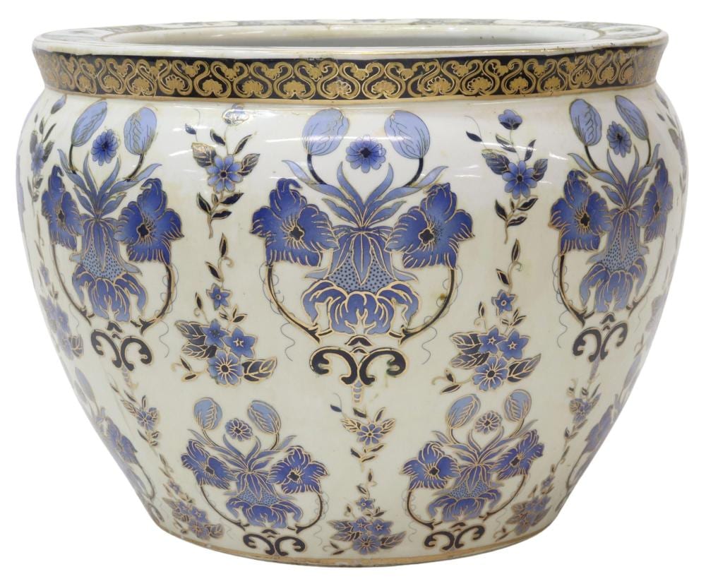 White porcelain fishbowl with blue floral and scroll patterns and an ornate blue rim, viewed from the front.