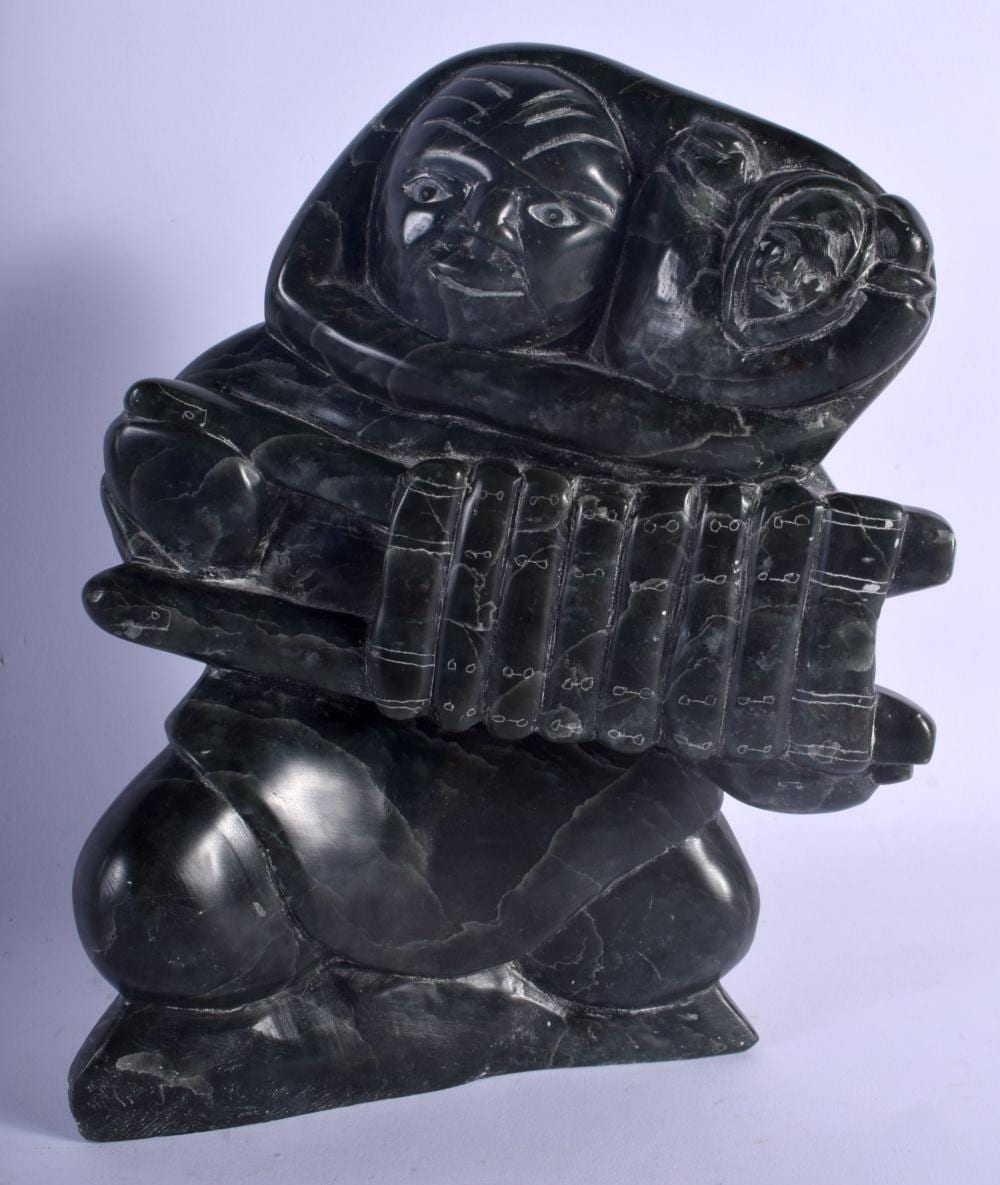 Jimmy Inaruli Arnamissak comparable auction result: jimmy inaruli arnamissak born 1946 inuit canadian green stone 20 cm x 12 cm