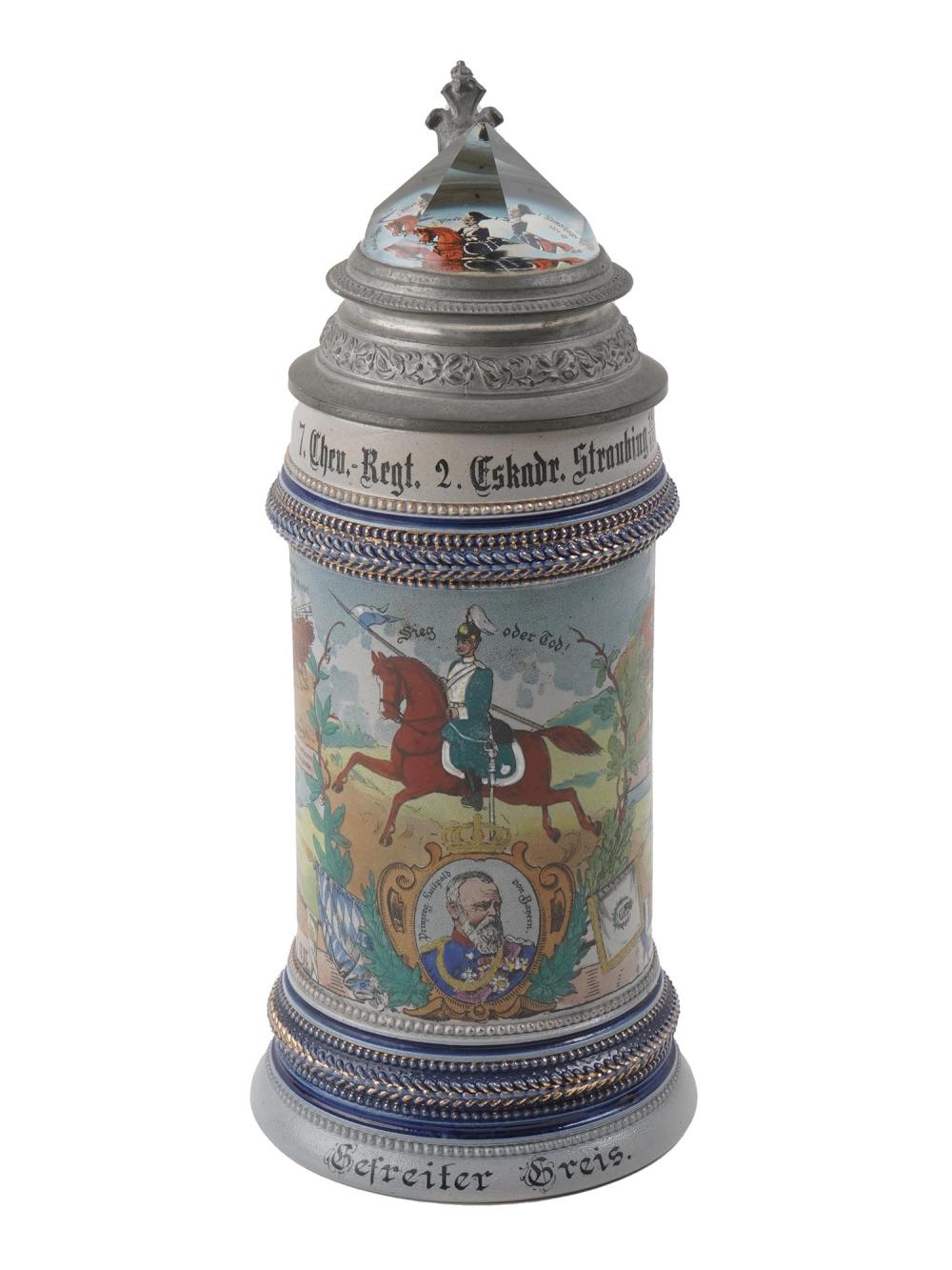 German-style beer stein with hinged lid, pewter handle, and colorful painted scene of a mounted rider and birds on a horse.