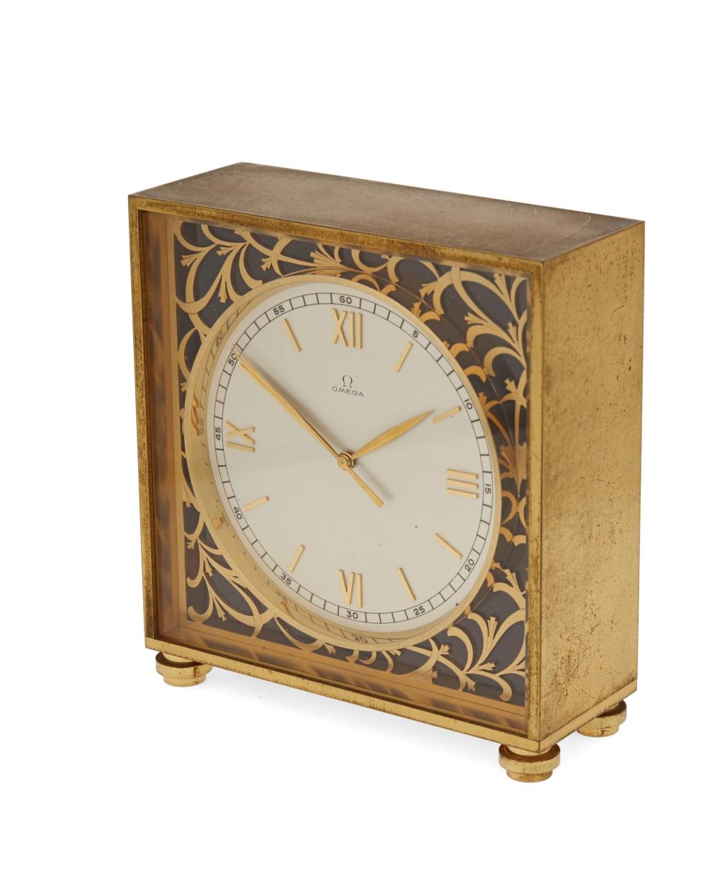 Auction comp thumbnail for An Omega "Deluxe" gilt-brass table clock, no. 5506 (John Moran Auctioneers, Lot 1056)